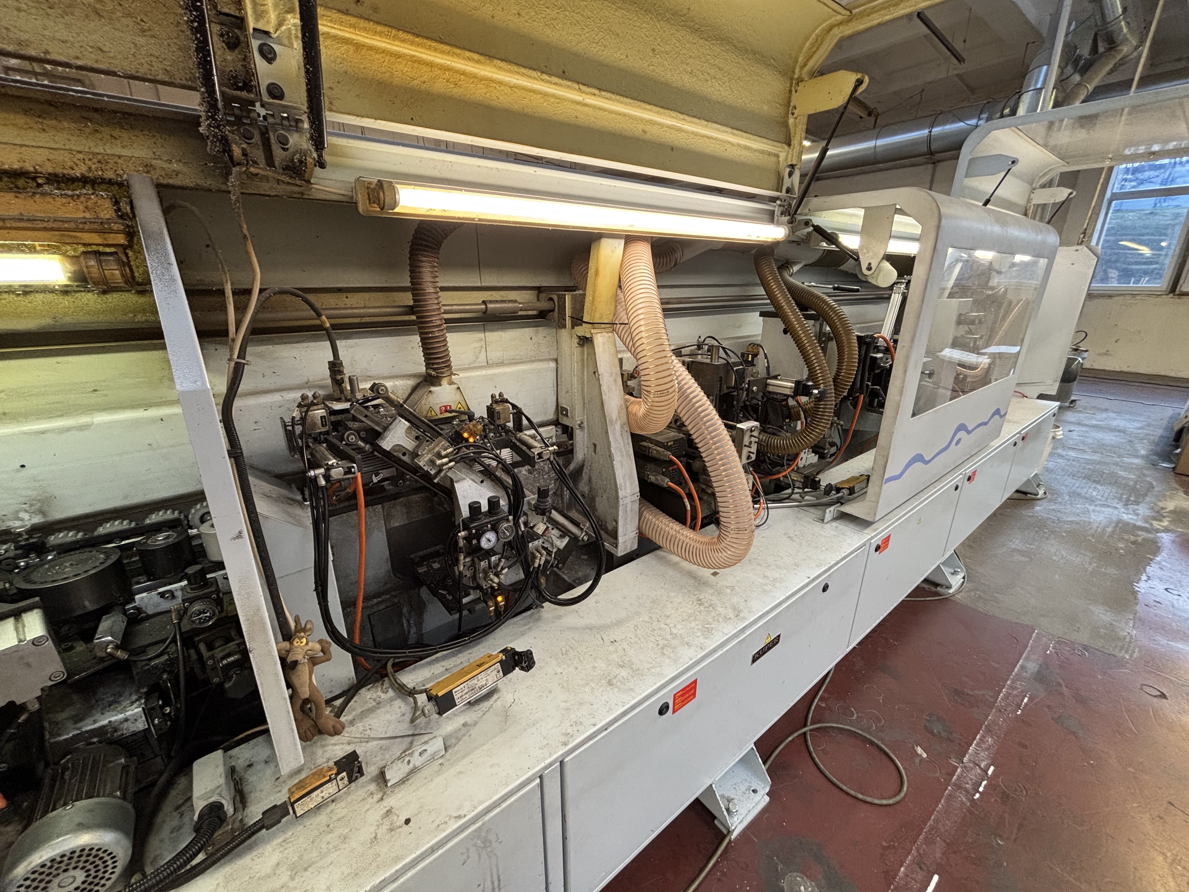 single-sided edge banding machine with workpiece return system / BRANDT / KDF 680